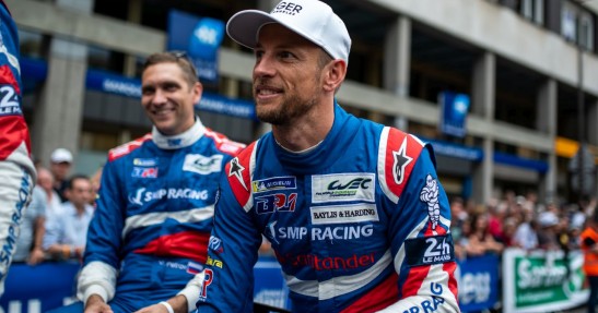 Jenson Button (w tle Witalij Pietrow)
